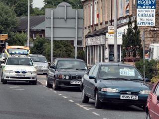 Police outside Super Auto Saver, Scotland Road, Nelson.