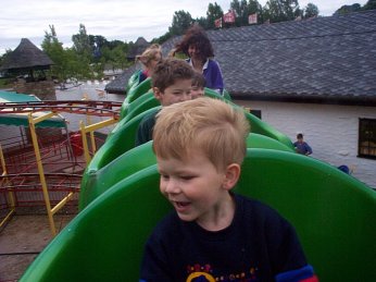 Picture of children enjoying one of the rides at Camelot