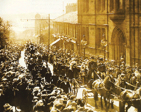 Picture of Wallace Hartley's funeral procession as it passes the Town Hall in Colne.